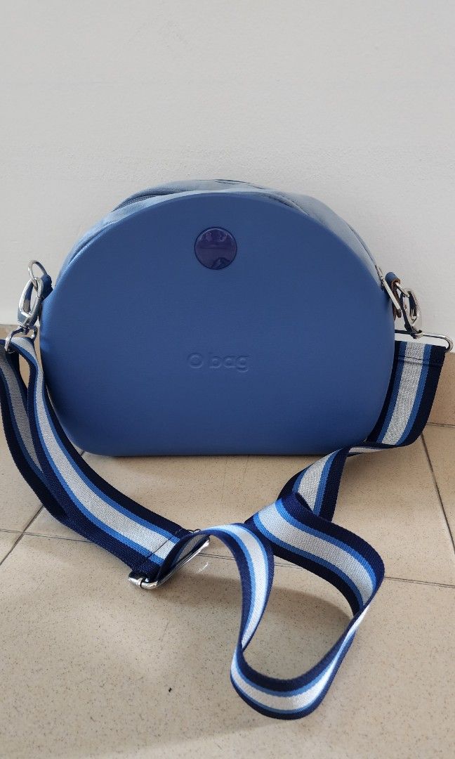 OBag Moonlight (Category: Cross-body Bags) located in Singapore. Submitted by ongsies (Listing ID 1358810157, Image 1). Description: Brand new original O Bag in blue with suede blue insert, and strap..