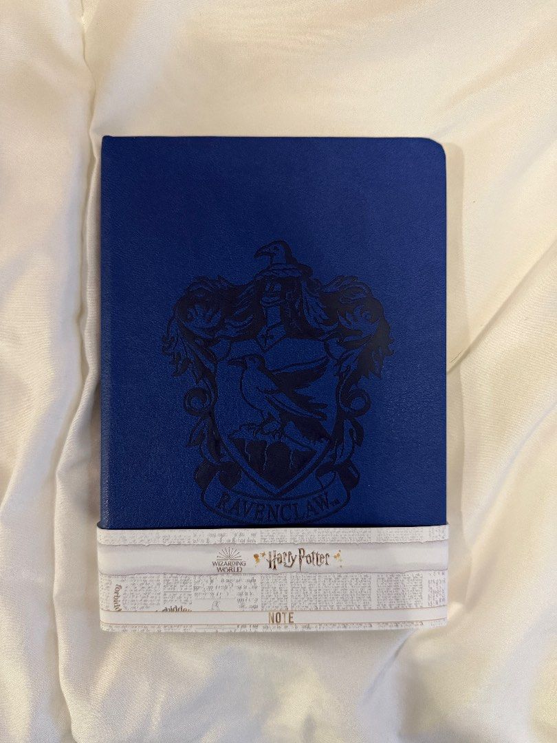 Official Harry Potter (Ravenclaw) notebook (Category: Storybooks) located in Muntinlupa City. Submitted by gizibaeph (Listing ID 1358805293, Image 1). Description: Brand new Only opened to see inside Blank notebook Measurements: 125x179mm Bought in CGV Yongsan, Seoul South Korea.