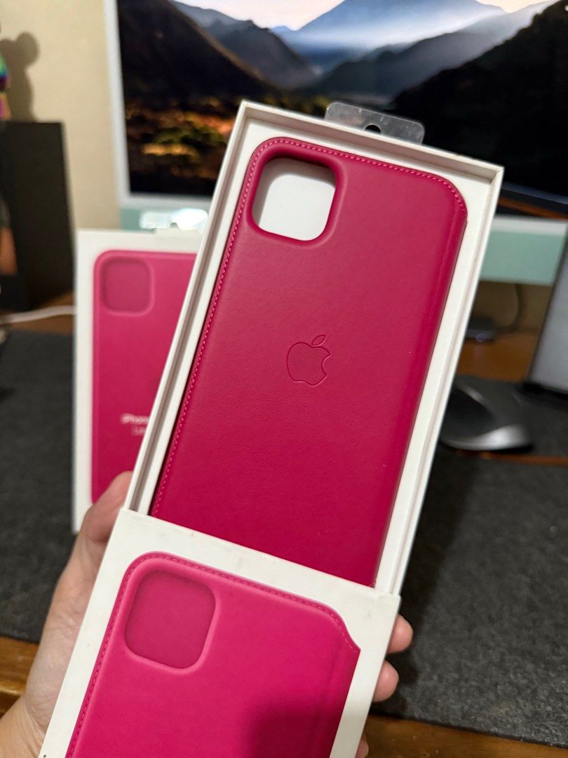 Original Apple Folio Leather Case for iPhone 11 Pro Max (Category: Cases & Sleeves) located in Manila. Submitted by razelysonn (Listing ID 1358839485, Image 3). Description: Fixed price ₱1,200 each barbie pink color, very cute :).