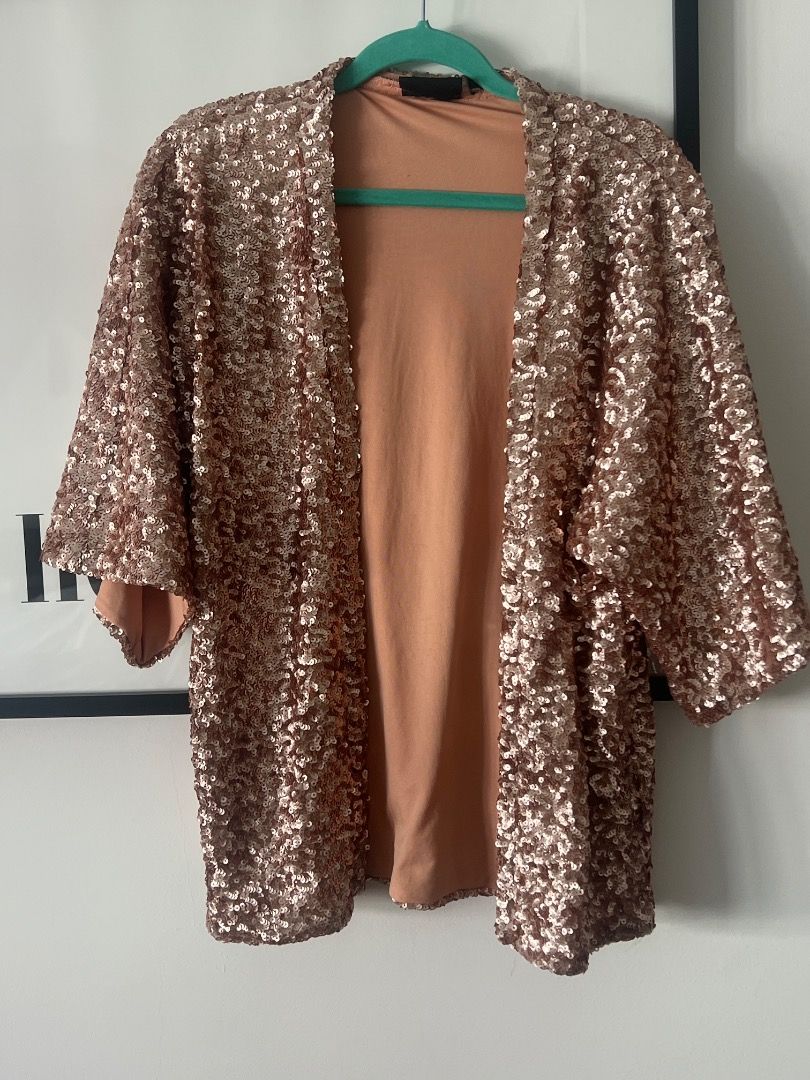 Sequin jacket (Category: Coats, Jackets and Outerwear) located in Singapore. Submitted by wildflowerhm19 (Listing ID 1358756124, Image 1). Description: Amazing sequin jacket Short sleeve Thick Looks amazing on the perfect festival addition Size is 12 Firetrap brand Bronze sequin .