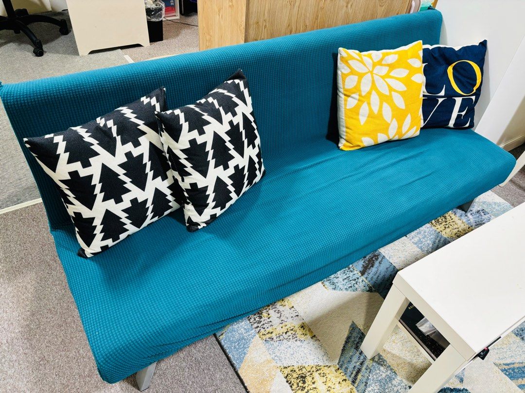 Sofa Bed (Category: Sofas) located in Singapore. Submitted by carcar (Listing ID 1358868633, Image 1). Description: Very good condition sofa bed up for grab! Material: PU (Red color) Comes with removable and washable sofa cover (Teal color) ** cushions not included Sofa setting: Approx: 180cmL x 78cm W x75cm ht Bed setting: Approx: 95cm width x 35cm ht Self collect from Link at AMK (near to YCK MRT) Sofa in almost brand new condition! Self collec