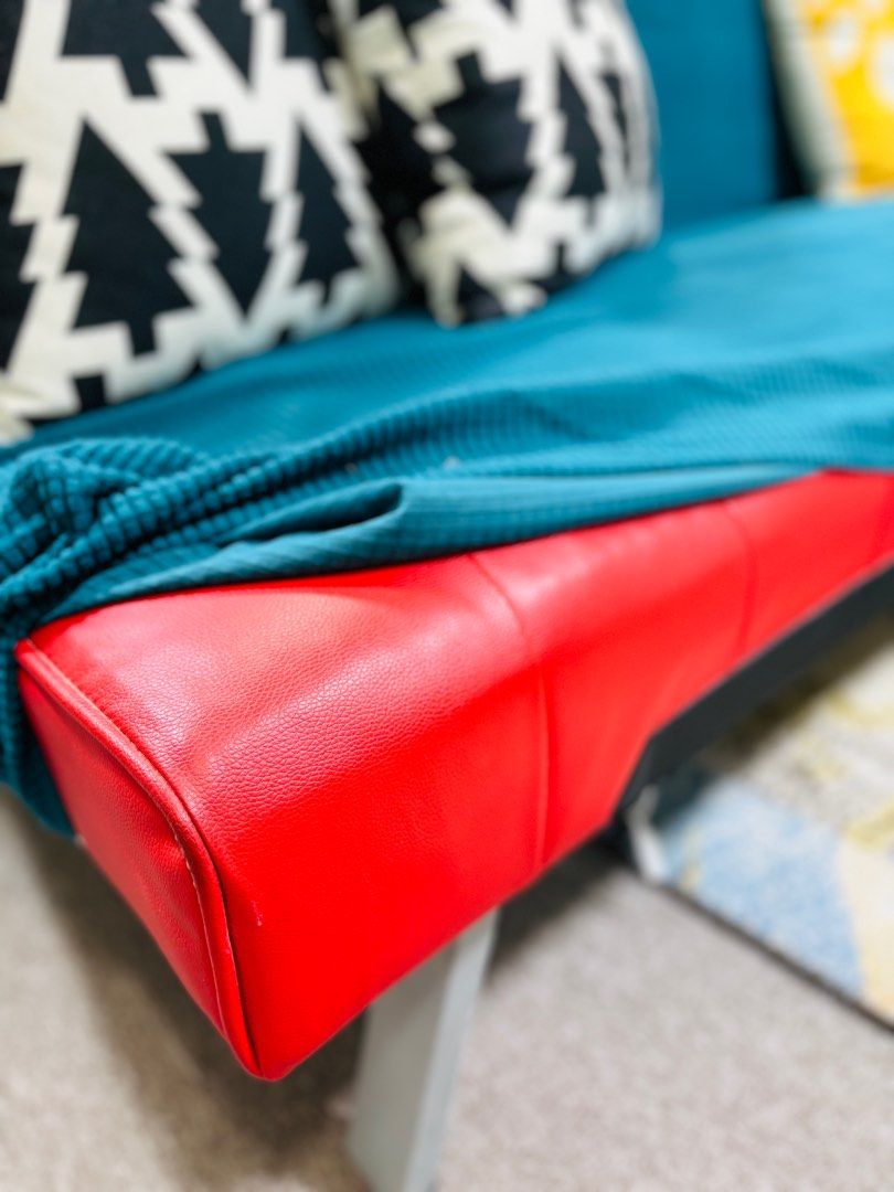 Sofa Bed (Category: Sofas) located in Singapore. Submitted by carcar (Listing ID 1358868633, Image 2). Description: Very good condition sofa bed up for grab! Material: PU (Red color) Comes with removable and washable sofa cover (Teal color) ** cushions not included Sofa setting: Approx: 180cmL x 78cm W x75cm ht Bed setting: Approx: 95cm width x 35cm ht Self collect from Link at AMK (near to YCK MRT) Sofa in almost brand new condition! Self collec