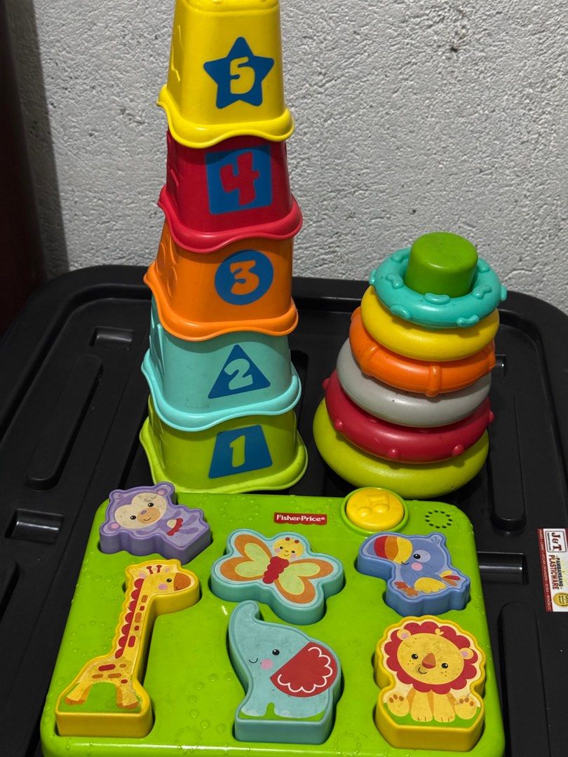 Bundle toys (Category: Infant Playtime) located in Marikina City. Submitted by phoebea15 (Listing ID 1359052647, Image 1). Description: Bundle only Rings Chico tower Fisher price animal shape sorter with music.