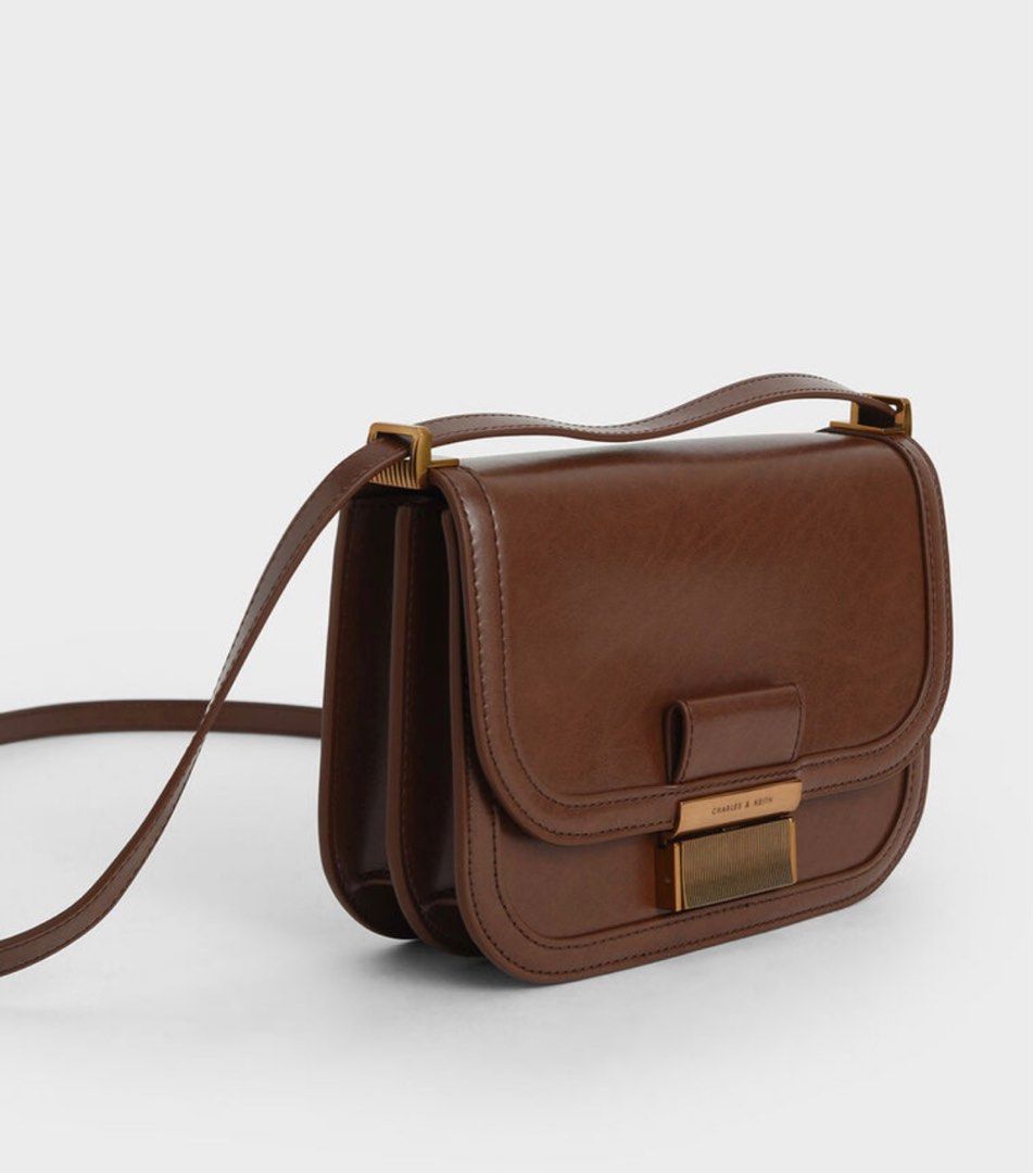 Charles & Keith cross body bag dark brown (Category: Shoulder Bags) located in Quezon City. Submitted by kysse (Listing ID 1359085776, Image 3). Description: Php 3,599 SRP Used once during a trip.