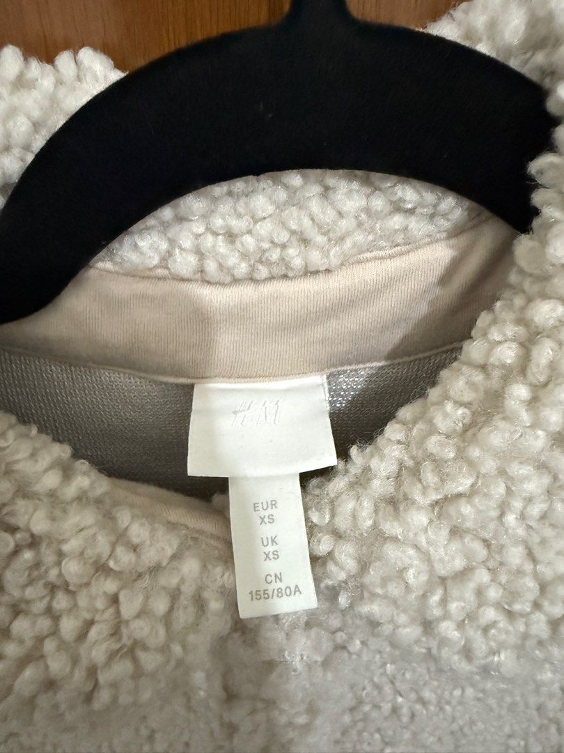 H&M Faux Shearling Jacket (Category: Coats, Jackets and Outerwear) located in Pasay City. Submitted by nh.declutter (Listing ID 1359052990, Image 3). Description: PLEASE READ: - Posted price is LAST PRICE. Lowballers will not be entertained. - No when worn pictures. - Item color may vary slightly due to lighting. - All items LISTED WITH BRANDS are GUARANTEED AUTHENTIC and bought by the seller either from the website of the said brand or from the 