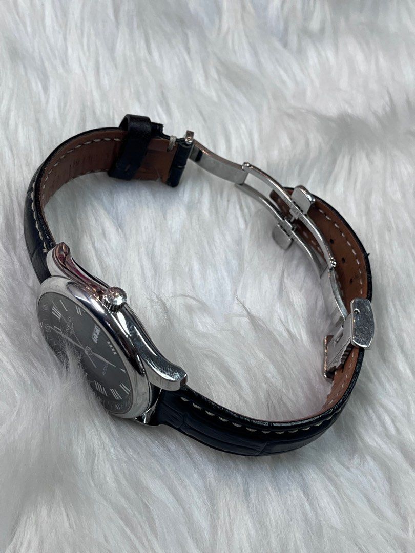 LONGINES Master Collection Day Date Men's Watch (Category: Luxury Watches) located in Taguig. Submitted by mhalet.902 (Listing ID 1359019536, Image 3). Description: Gender: Men’s Reference #: L27554516 Year Model: 2010’s Movement: Automatic Case Size: 38mm Case Material: Stainless Steel Strap Size: 7” Crystal: Sapphire Dial Type/Color: Analog/Black Water Resistance: 30m Calendar: Day and Date Display Band Type: Strap Band Material: Leather Clasp: