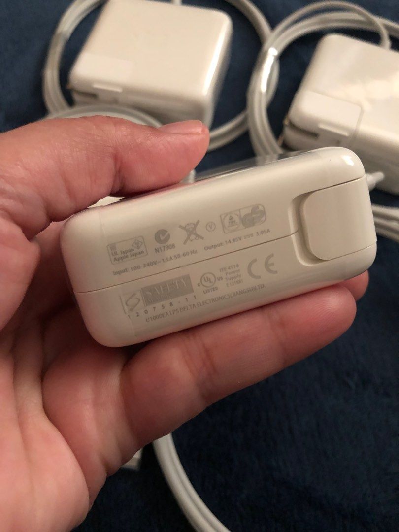 Magsafe 2 T Type 45watts for Macbook Charger (Category: Chargers) located in Pasig City. Submitted by lailahbeauty (Listing ID 1358948593, Image 3). Description: For sale onhand Magsafe 2 T type 45watts for macbook charger. If you want to know more information message me directly for more details. Original charger from Japan. Price is ₱1,350 each and its fixed so dont make offer if less than this price. There is available 85watts if u needed. I c