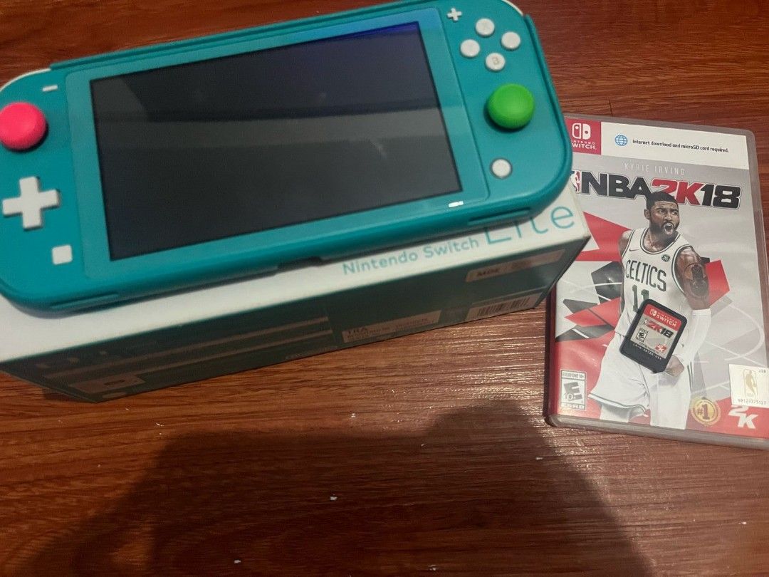 Nintendo Switch Lite (Category: Nintendo) located in Paranaque City. Submitted by GarageSalePhl (Listing ID 1359048745, Image 1). Description: Nintendo Switch Lite (Turquoise Blue) Like new Complete with Box Charger Hard Case Tempered glass since day 1 With game, NBA 2k18 Only 5.5k.