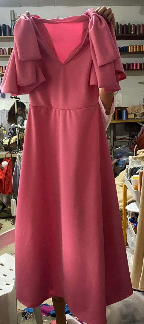 PINK FORMAL DRESS (Category: Dresses) located in Pasig City. Submitted by itsdeclutter_time (Listing ID 1359093243, Image 1). Description: like new condition worn once in a wedding fits small to large frames 33 inches from waist part neoprene fabric stretchable fabric flaw: last 3 pics MOP: gcash or bpi pick up: pasig/ taguig sf: c/o buyer.
