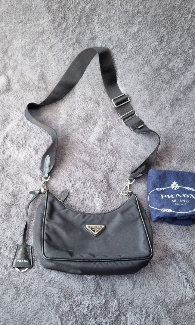 Prada Nylon Sling (Category: Luxury Bags & Wallets) located in Talisay. Submitted by parchiracollection (Listing ID 1359021310, Image 1). Description: *Self authenticate; kayo na humusga *Provided dust ba*plus SF *Please check detailed pictures before purchasing * This is a second-hand item, kaya wag po mag expect na BAGO *no to low ballers. The discounted price I'll give is the final price. *NO COD, NO COP, NO $h0p€€ CHECK OUT *MOP: GCASH *COURI