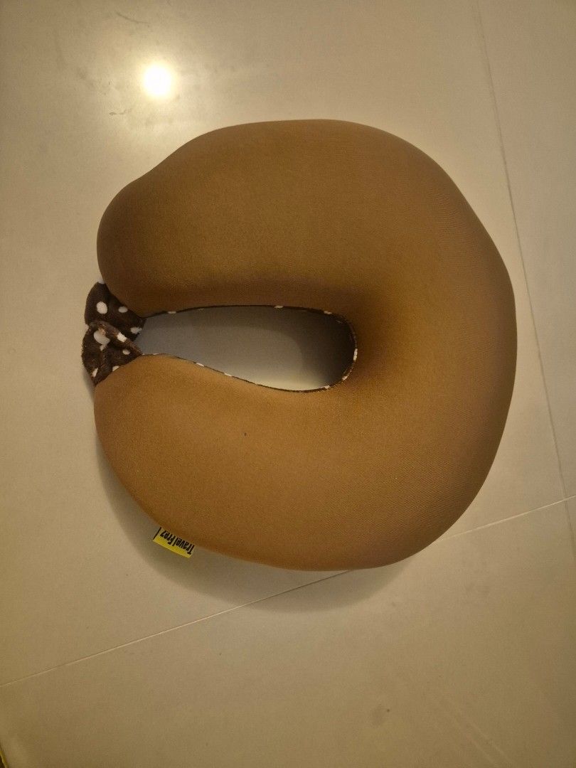 Travel Neck Pillow (Category: Others) located in Perth. Submitted by pawpals (Listing ID 1359029141, Image 2). Description: Selling as seen in the pictures. Never used. Cover is not removable for wash. Cash on pick up. No silver coins please. No holds, so please message when ready to pick item up on the day. All communications via Carousell. Please see the pictures provided on the item and read the descriptions in full. I am just a private seller