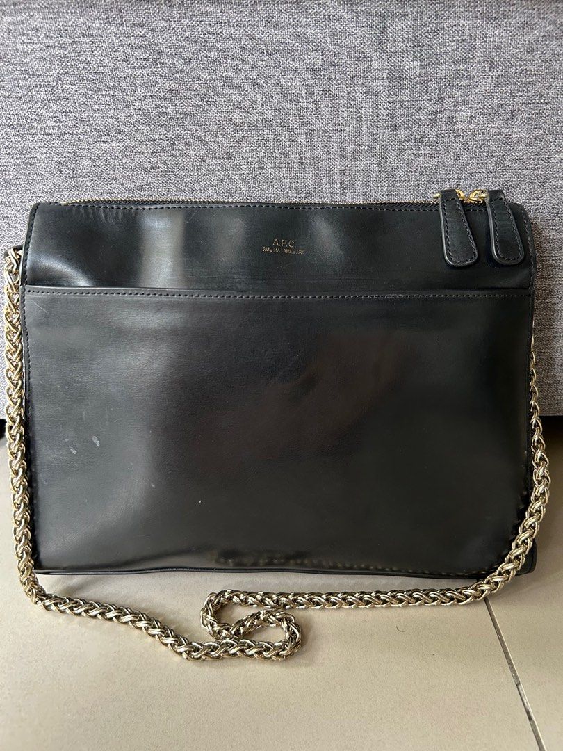 APC Ella chain shoulder bag in black (Category: Luxury Bags & Wallets) located in Quezon City. Submitted by vmr.closet.cleanup (Listing ID 1359134769, Image 1). Description: Authentic Ella chain shoulder bag in black. Light gold hardware, slightly tarnished. Shows tolerable signs of use Has some scratches, typical of smooth leather bags. Classy, old money vibe. Gash or bank stransfer. Add shipping.