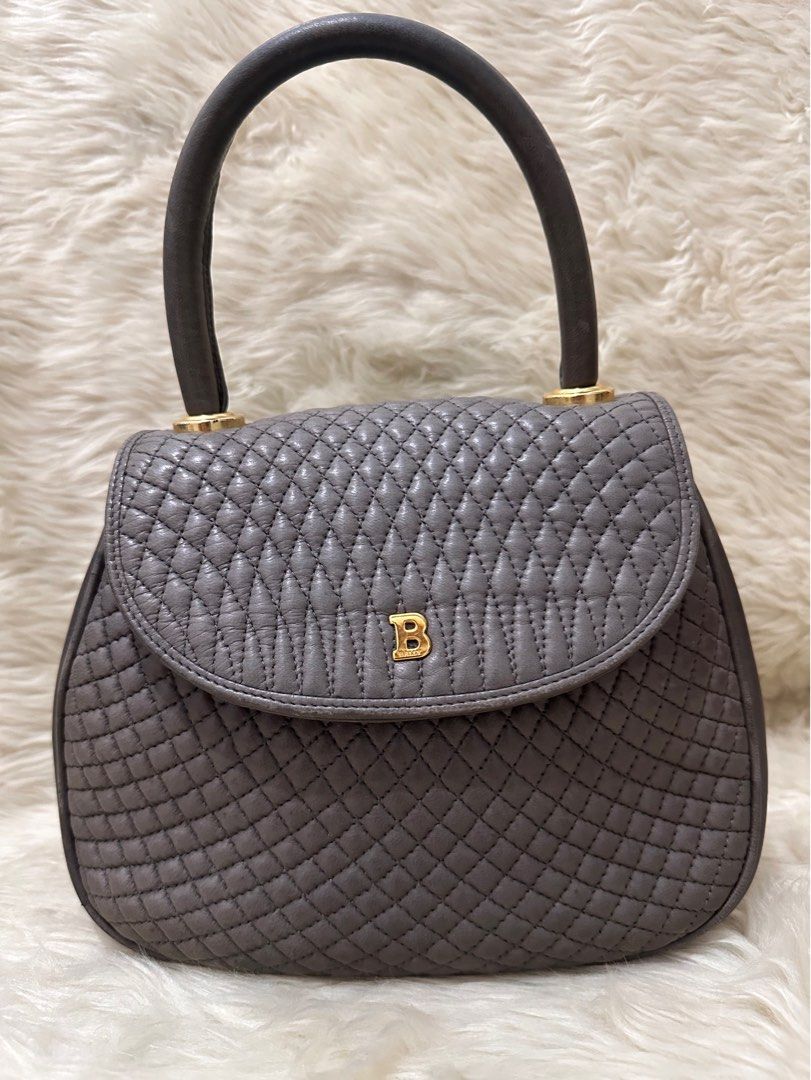 Bally Top Handle Quilted Bag (Category: Luxury Bags & Wallets) located in Makati City. Submitted by petite_preloved2 (Listing ID 1359124989, Image 1). Description: Uneven color in some parts. but still beautiful and elegant .