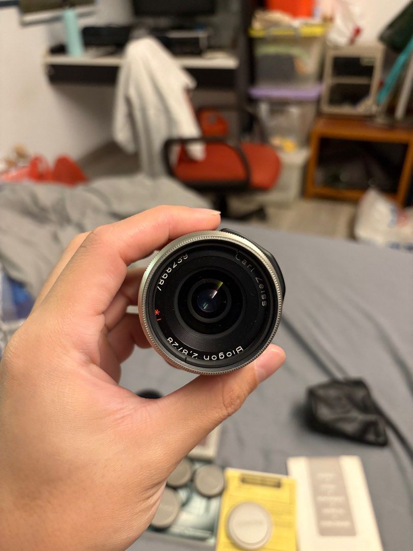 Contax G2 with 28, 45, and 90mm lenses (Category: Cameras) located in Singapore. Submitted by jmaxtan (Listing ID 1359229684, Image 2). Description: Near mint contax g2 set. Comes with 2 original matching contax filters for the 28 and 45mm. Also comes with 2 hoods .