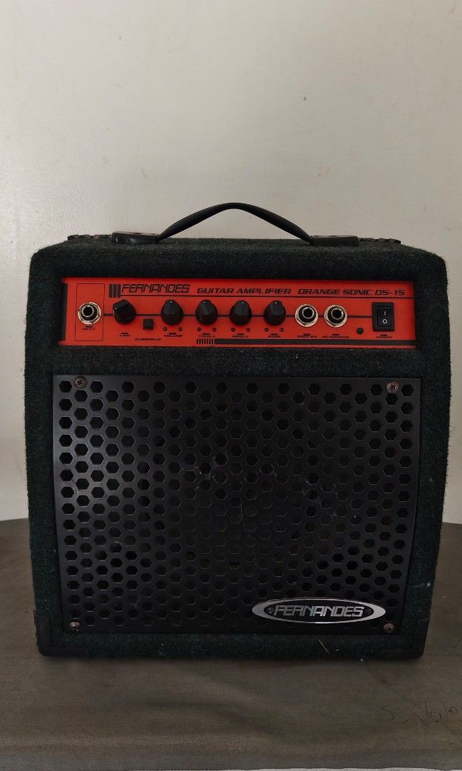 Fernandes GUITAR AMPLIFIER (Category: Soundbars, Speakers & Amplifiers) located in Manila. Submitted by babz30261 (Listing ID 1359168904, Image 1). Description: FERNANDES MODEL OS-15 POWER AC 100V‼️‼️‼️‼️ 13 WATTTSSS‼️‼️‼️ SPEAKER RATING 20WATTS SERIAL NO. 01010077 FERNANDES GUITAR AMPLIFIER ORANGE SONIC 0S-15 GAIN OVERDRIVE VOLUME TREBLE MIDDLE BASS FOOT SW INPUT COMPLETE KNOBS ALL ARE WORKING CONDITION TESTED OKAY ‼️‼️‼️‼️‼️👍👍👍👍 WE DELIVER 