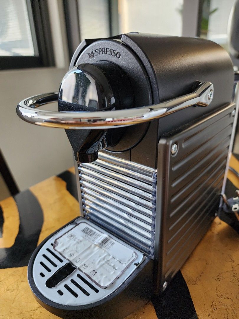 FINAL SALE! Nespresso Pixie Coffee Machine (Category: Coffee Machines & Makers) located in Quezon City. Submitted by klyang068 (Listing ID 1359169219, Image 2). Description: Nespresso Pixie Coffee Machine slightly used. Comes with box..