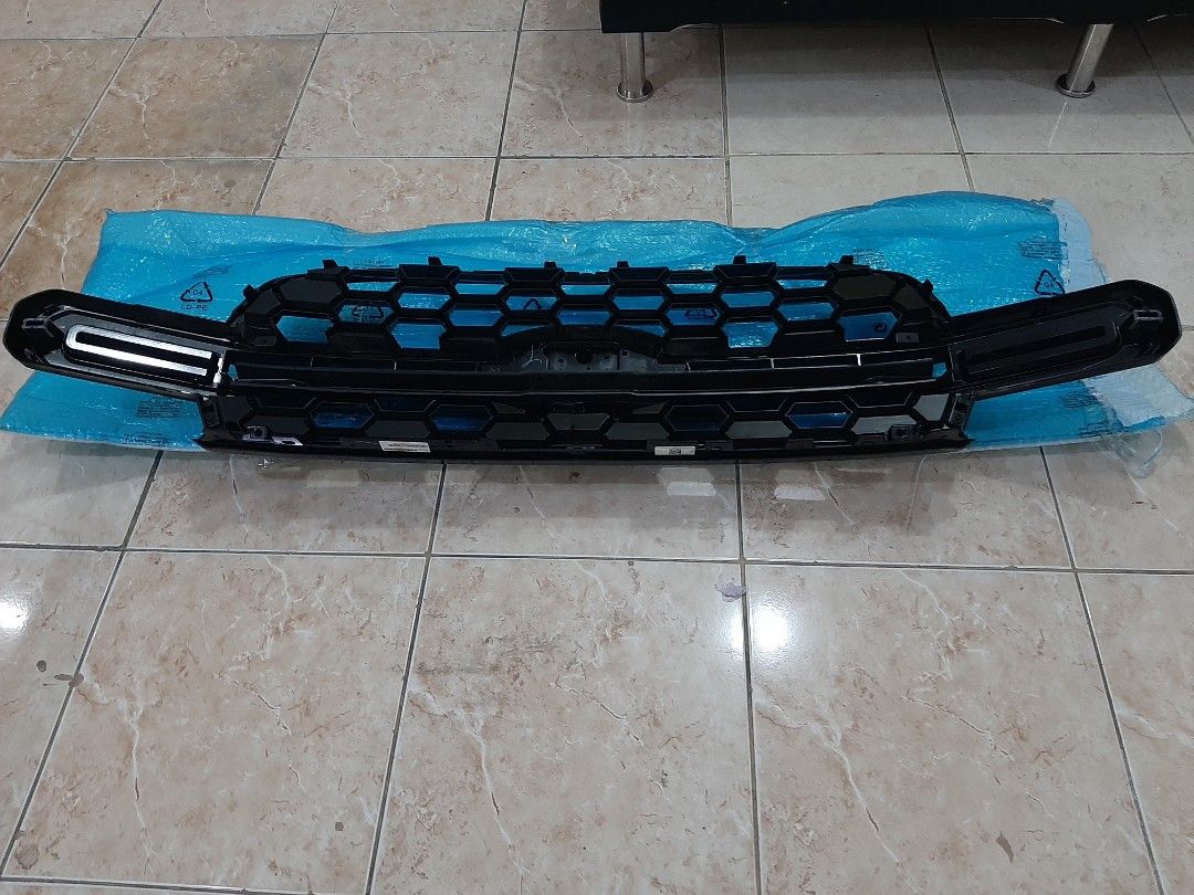 Ford Ranger Front Grill Original Stock (Category: Other Automotive Parts and Accessories) located in Pasig City. Submitted by yramguill (Listing ID 1359147470, Image 2). Description: Ford Ranger Wildtrak Front Grill with visors. Never used change after 2 days of purchased..