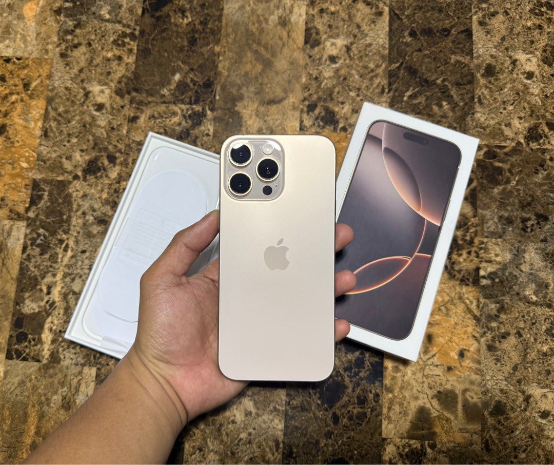 iPhone 16 Pro Max (Category: iPhone 16 Series) located in San Juan City. Submitted by hakobzone (Listing ID 1359151392, Image 1). Description: iPhone 16 Pro Max 256gb for sale or swap! 61k selling fixed! Details: Unit is in excellent condition around 97 percent smooth With dent/fade sa baba smooth overall! 79 cycle count as of posting Openline NTC approved variant No issue Warranty until December next year 256gb Dessert titanium Open for swap: 65