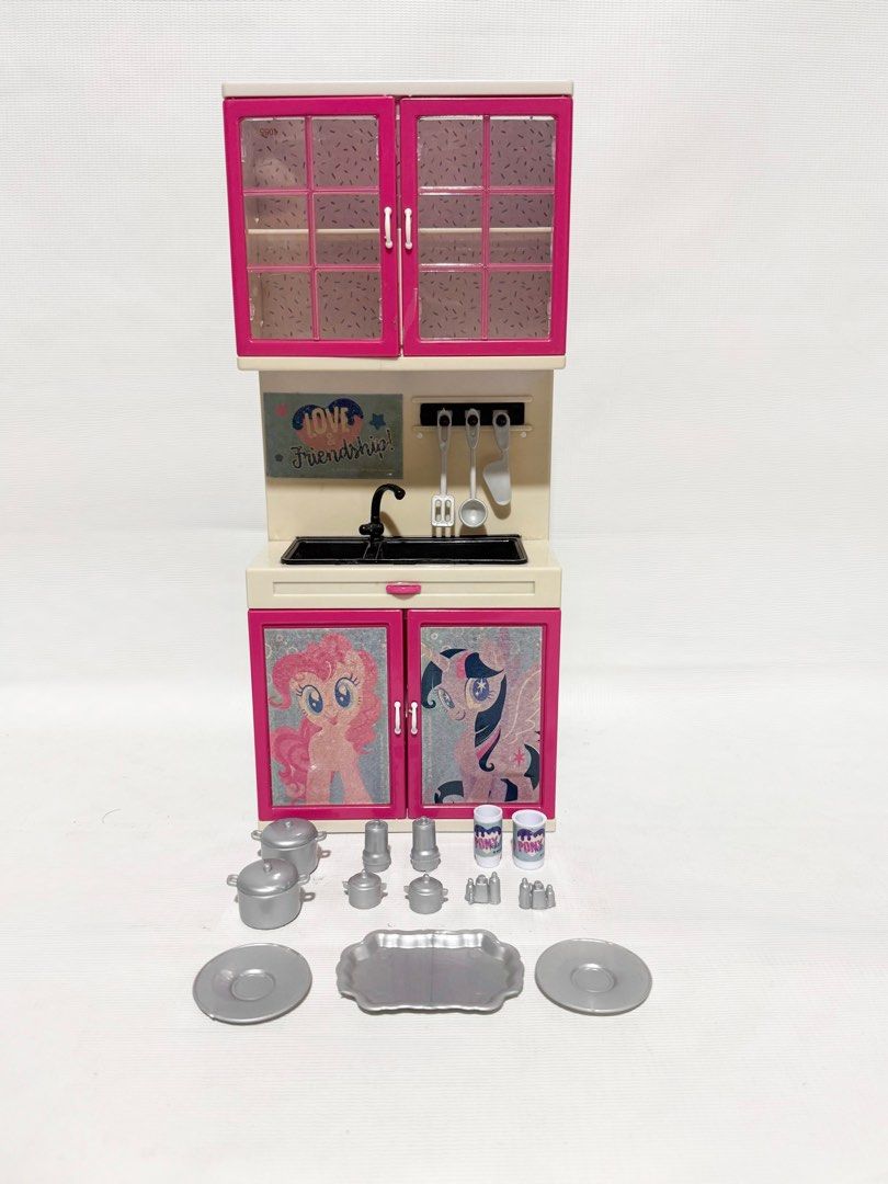 My Little Pony Mini Kitchen Playset with Accessories (Category: Kids Toys) located in Cainta. Submitted by mly_d (Listing ID 1359248402, Image 1). Description: My Little Pony Mini Kitchen Playset with Accessories ₱ 300 • This kitchen play set comes with a platter, 2 plates, cooking utensils, 2 pots with lid, tumblers and more. • This is perfect for kitchen pretend games as it has all the kitchen items as real-life settings, making the make-believ