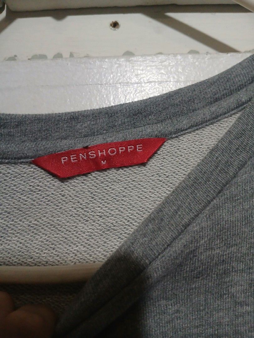 Pre Loved- Penshoppe- Gray Hole Design Sweatshirt- Medium Size (Category: Coats, Jackets and Outerwear) located in Quezon City. Submitted by mimil_ (Listing ID 1359269018, Image 3). Description: Penshoppe Gray sweatshirt with hole deisgn Can fit from small to medium size Used it twice or thrice.