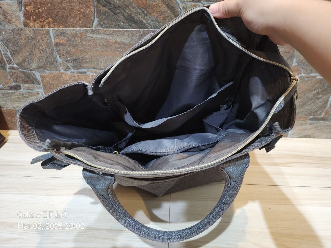 Anello Backpack 2-way Tote Backpack (Category: Luxury Bags & Wallets) located in Marikina City. Submitted by keen.sabkeith (Listing ID 1355975885, Image 3). Description: The popular heathered polyester canvas series comes with a 2-way backpack that can also be used as tote bag Color: Gray 10 pockets (inner pockets - 4; outer pockets - 6) H: 37 cm W: 27 cm D: 15 cm Originally bought from Anello Japan. NO receipts po as this was a pasabuy from my f