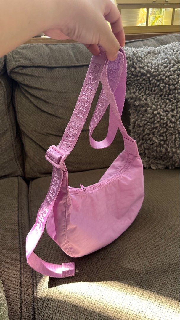 Baggu Small Nylon Crescent Bag Light Arctic Pink (Category: Cross-body Bags) located in Manila. Submitted by zlook (Listing ID 1347882848, Image 1). Description: Retails for 48 USD 1 stock only BAGGU small nylon crescent bag. BAGGU’s crescent bag in a smaller size that’s effortlessly casual and just roomy enough to carry your most-needed essentials. Comfy BAGGU shoulder bag silhouette with an adjustable tonal logo strap, it wears comfortably acro