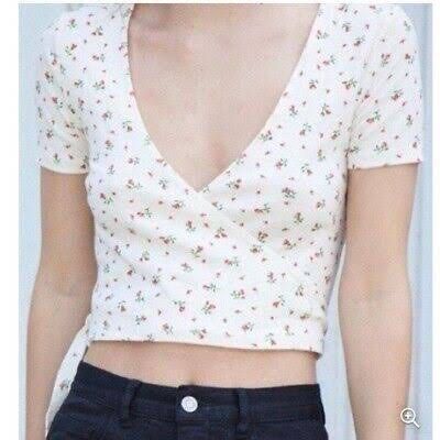Brandy Melville Rae Floral Red Wrap Top (Category: Blouses) located in Las Pinas. Submitted by johasell (Listing ID 1355892013, Image 1). Description: 💬 - pm for actual photos - free size - good qual and cute! just havent worn it in a while mop: gcash | mod: ggx or any add.