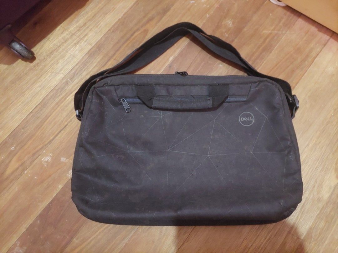 Dell Laptop Bag with Sling (Category: Laptop Bags & Sleeves) located in Cavite. Submitted by fayesumaylo (Listing ID 1355920999, Image 1). Description: PRELOVED item rfs: decluttering.