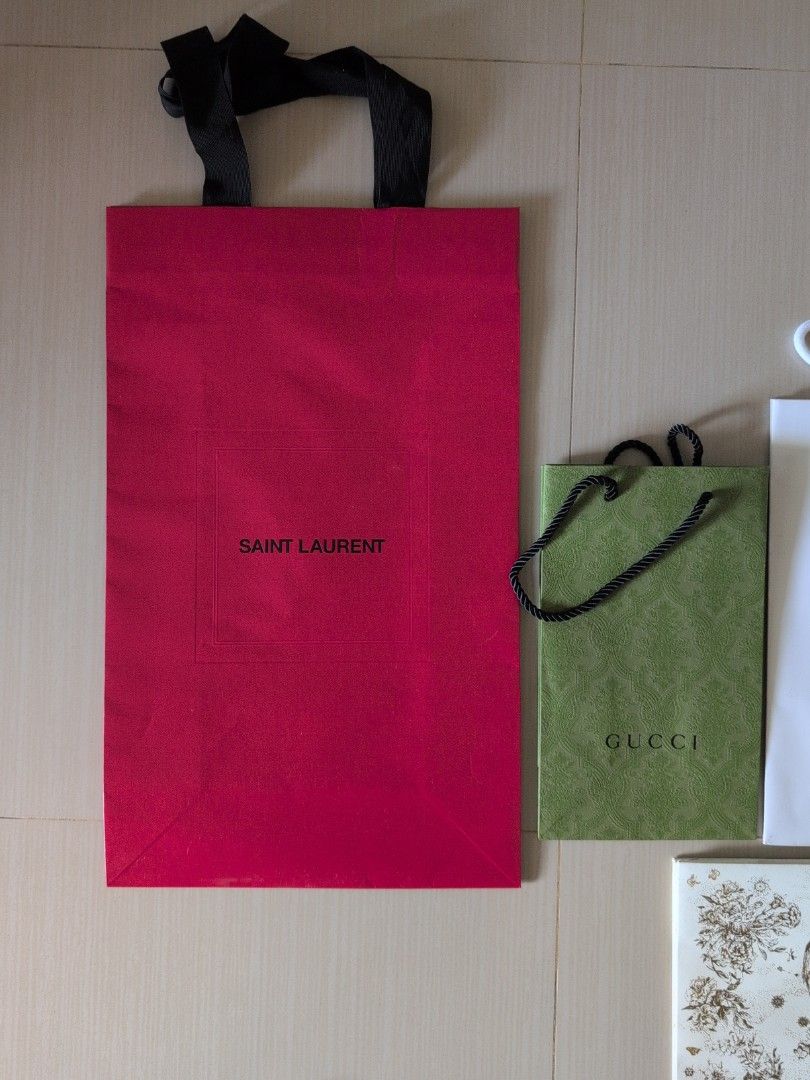 Dior / YSL / Chloe/ Gucci paper bag (Category: Bags & Wallets) located in Singapore. Submitted by thekiaplings (Listing ID 1355850715, Image 2). Description: Gucci -$7 YSL -$5 (Big, can fit Medium Size box) Chloe- SOLD Dior - SOLD.