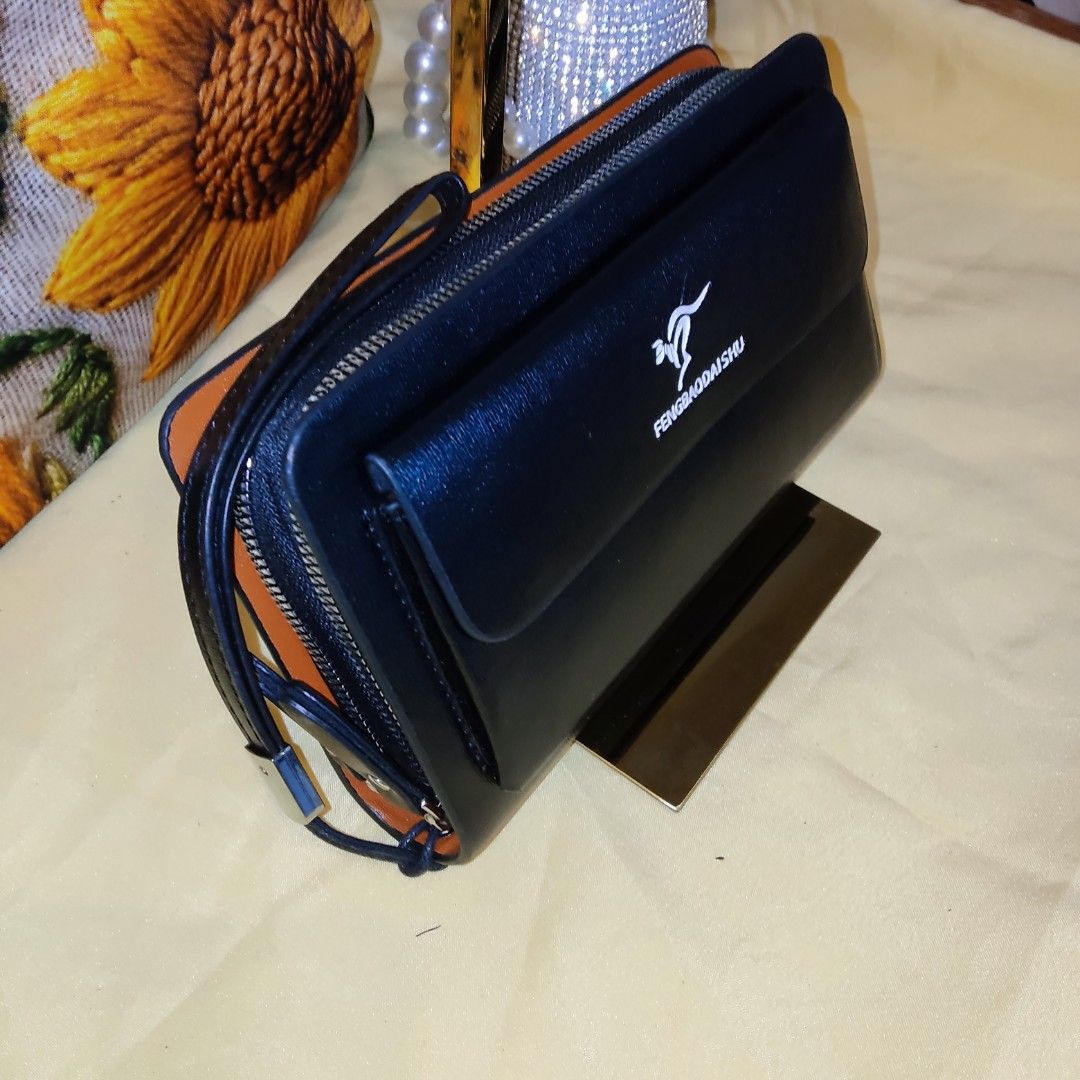 FENGBAODAISHU (Category: Clutches) located in Quezon City. Submitted by legitimo (Listing ID 1355856479, Image 3). Description: Brand-new/leather.