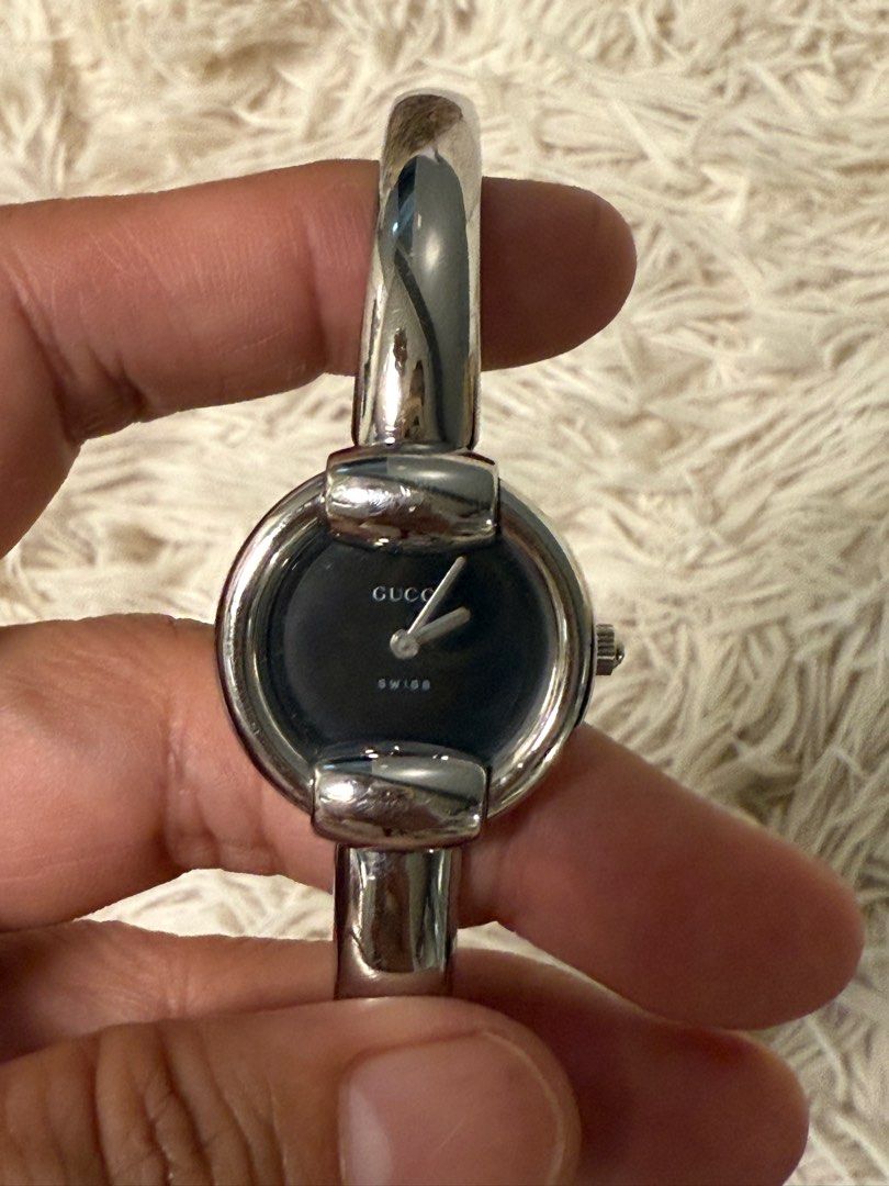 Gucci bangle watch (Category: Women's Watches) located in Manila. Submitted by rlights13 (Listing ID 1355895815, Image 1). Description: Gucci bangle watch with box only 25mm face size Wrist size 7.5-8inches.