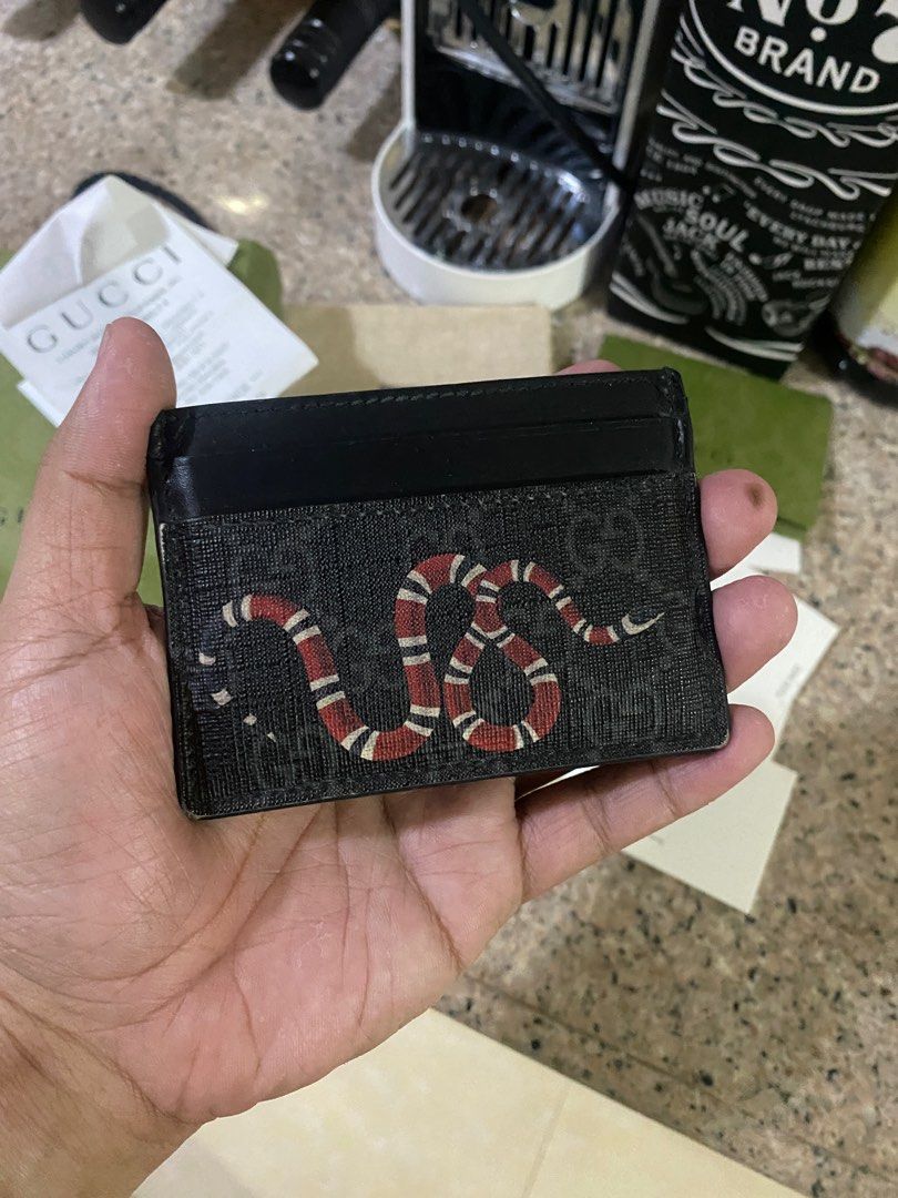 Gucci Snake Card Holder (Category: Luxury Bags & Wallets) located in Quezon City. Submitted by rg1996 (Listing ID 1355998543, Image 2). Description: Gucci Snake card holder with box, dustbag, cards, paper bag, and receipt Used condition 7.5k only Thanks! .