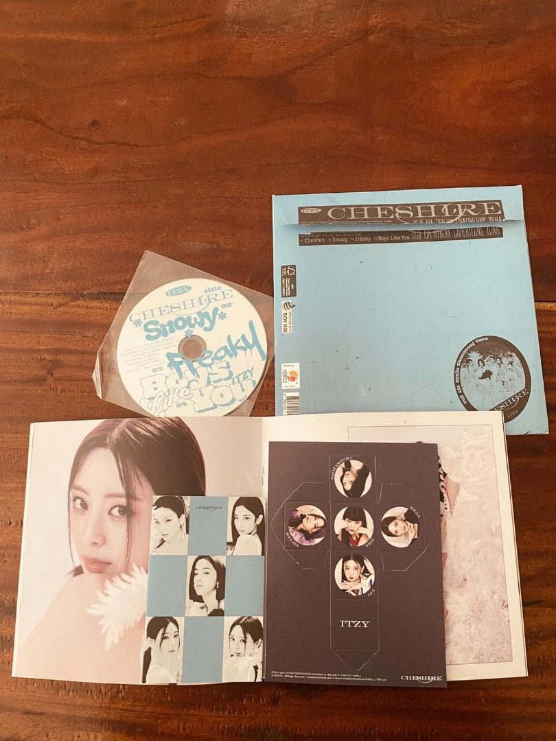 ITZY Cheshire Special Edition Album B Version (Unsealed) (Category: CDs & DVDs) located in Bulacan. Submitted by orange.locker (Listing ID 1355922391, Image 2). Description: Does not include photocard and special poster. Only CD-R and Photobook..