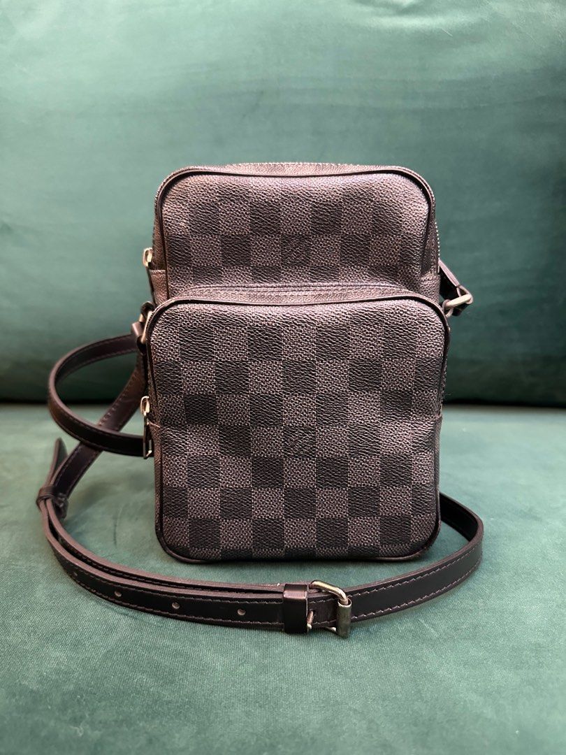 Louis Vuitton Damier Graphite Cross-Body Bag (Category: Luxury Bags & Wallets) located in Pasig City. Submitted by impact123 (Listing ID 1356029946, Image 2). Description: Barely used LV Damier Graphite Crossbody. Comes with Box & Dustbag. Bought in Tokyo, Japan. RFS: Too small for me. https://us.vestiairecollective.com/men-bags/bags/louis-vuitton/black-leather-louis-vuitton-bag-46673259.shtml.