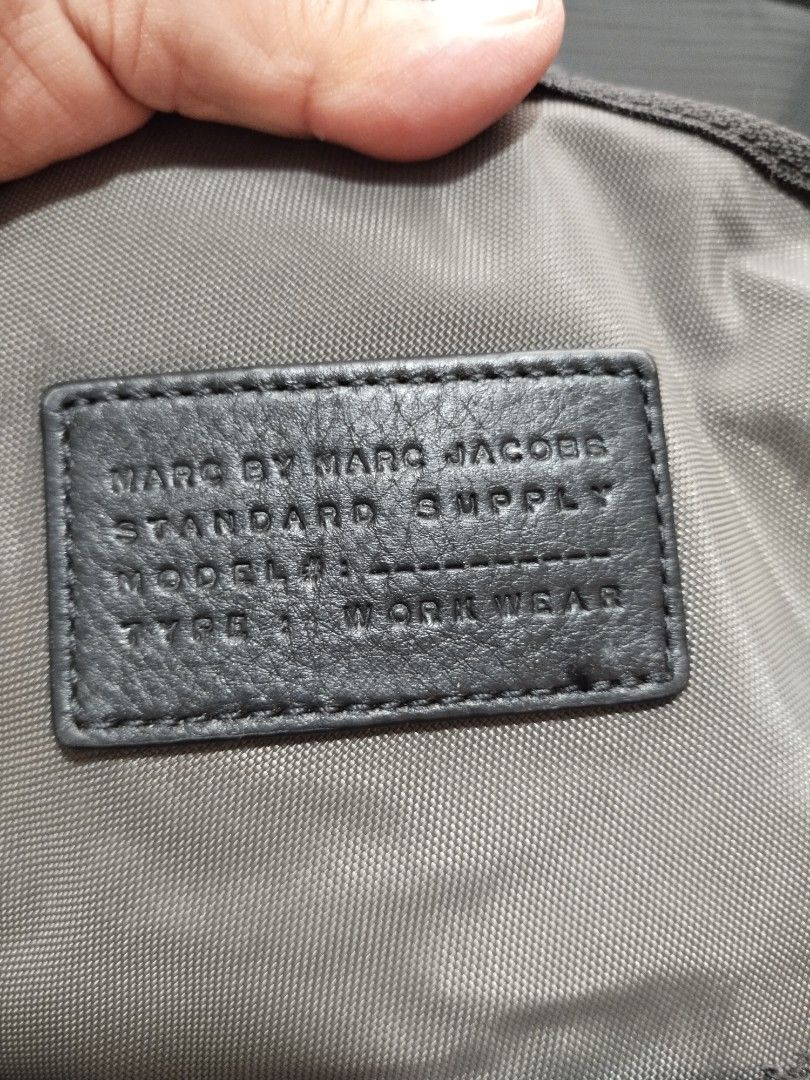marc jacobs backpack (Category: Luxury Bags & Wallets) located in Baguio. Submitted by roozeydluc (Listing ID 1356012956, Image 3). Description: polyester material large size l:12.2" w:5" h:16.5" 🔎 slight rubs sa edges ng base 🔎small dirt/stain sa base 🔎 himolmol sa may opening ng front pocket ✓1 zippered compartment ✓2 zippered front pocket.