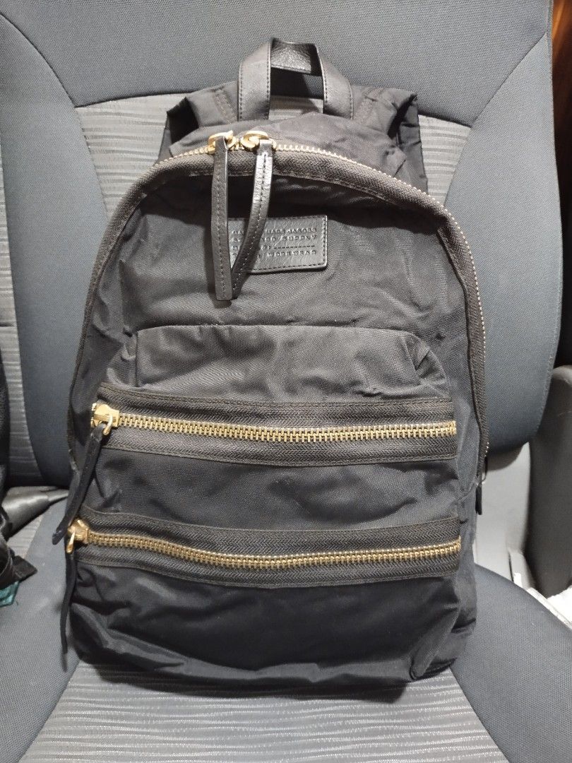 marc jacobs backpack (Category: Luxury Bags & Wallets) located in Baguio. Submitted by roozeydluc (Listing ID 1356014638, Image 1). Description: polyester material large size l:12.5" w:5" h:16.5" 🔎mga small bubbles sa side part ✓1 zippered compartment ✓2 zippered front pocket.