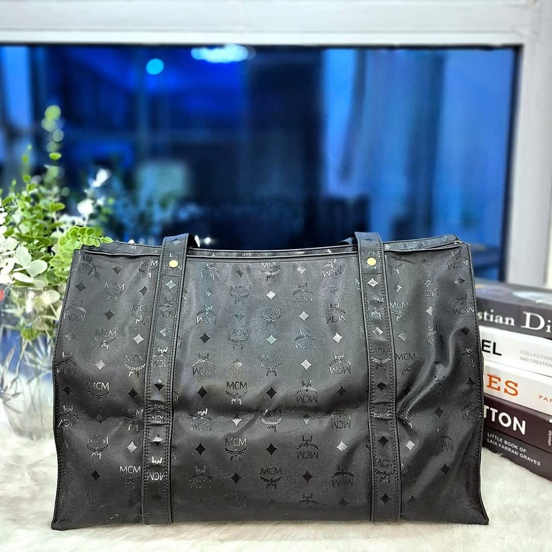 MCM Travel Bag (Category: Luxury Bags & Wallets) located in Caloocan City. Submitted by lujosacollection (Listing ID 1356021299, Image 2). Description: 100%Authentic/Original Preloved MCM Travel Bag In very good condition No inclusion.
