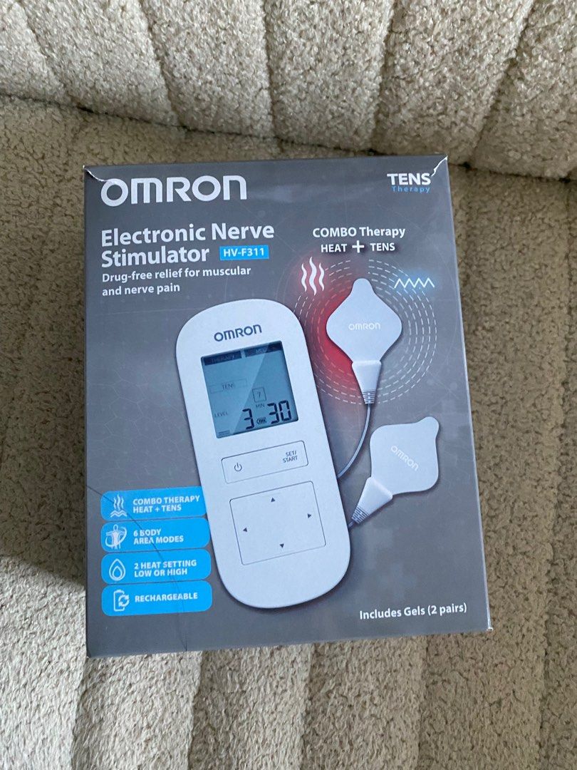 OMRON Electronic Nerve Stimulator HV-F311 (Category: Massage Devices) located in Pasig City. Submitted by shopsukiph (Listing ID 1355954804, Image 1). Description: OMRON TENS Therapy Combo Heat + TENS Used once! The OMRON HV-F311 offers both soothing heat and relieves pain using TENS technology. It is a drug-free therapy intended for reducing and relieving muscles and joints pain, stiffness and numbness in the back, arms, legs, shoulders and feet