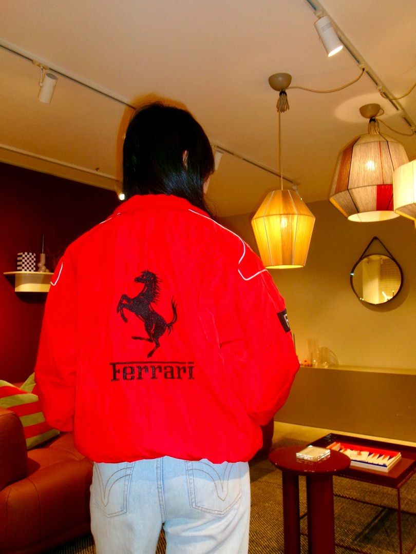 Scuderia Ferrari F1 Racing Jacket (Category: Coats, Jackets and Outerwear) located in Marikina City. Submitted by 1800shelves (Listing ID 1355891756, Image 3). Description: Scuderia Ferrari F1 Racing Jacket (red) Brand new Large oversized - 23.5 W x 27 L Full front & back embroidery & patches 🏷️ P 2,500 PM for more details. Tags: Ferrari Jacket, racing jacket, ferrari, scuderia ferrari, F1.