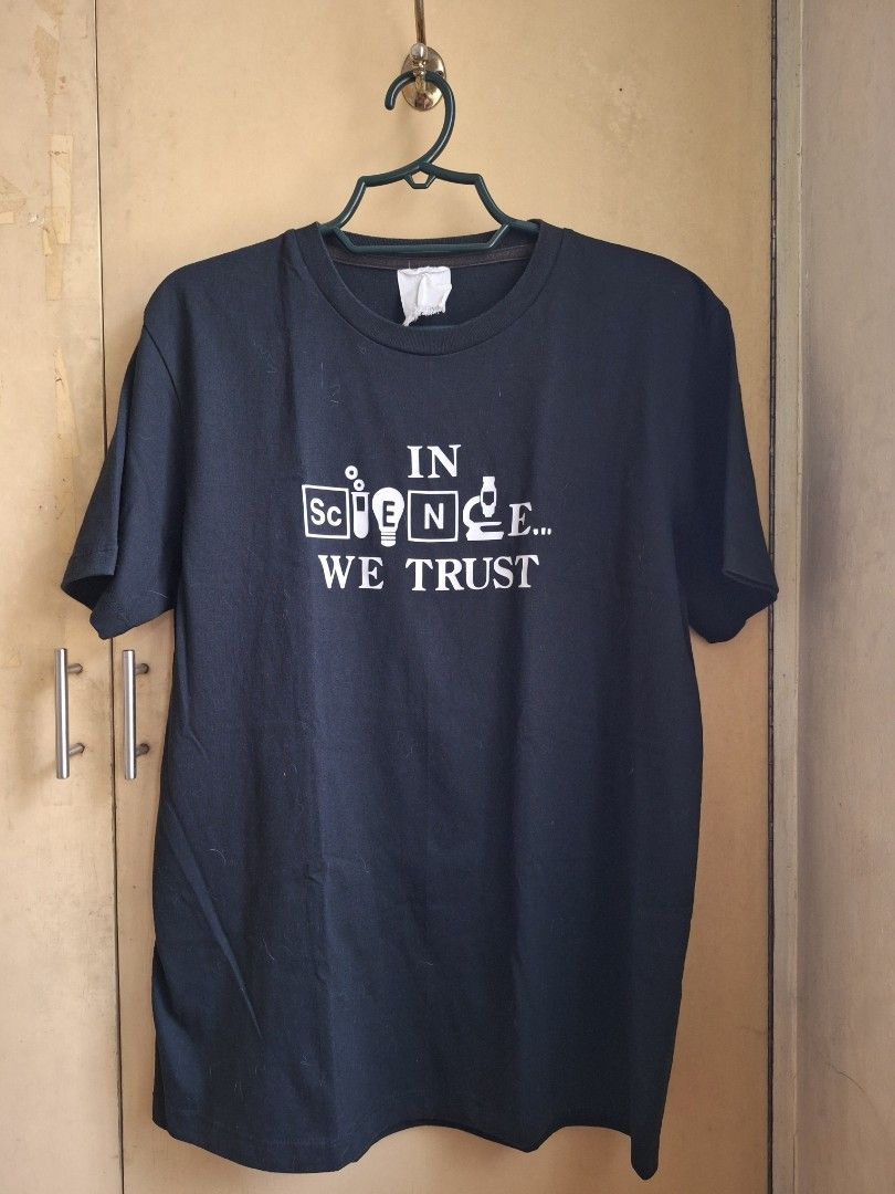T-shirt - In Science We Trust (Category: Tshirts & Polo Shirts ) located in Quezon City. Submitted by ca.thrift.thy (Listing ID 1355893915, Image 1). Description: In Science We Trust 💕Lady owned 💕Color Black 💕Used but not abused 💕Medium 💕 Length & Width on photos 🛑 Please note that this t-shirt is used. So manage your expectations when buying. DM for queries..