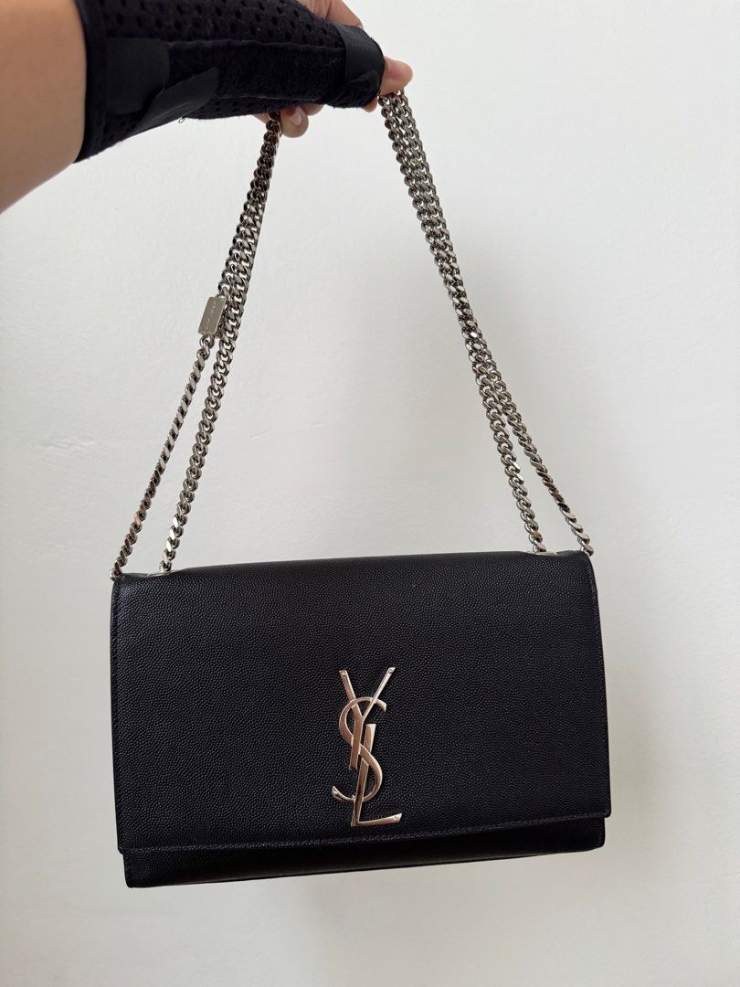 YSL Kate medium size (Category: Luxury Bags & Wallets) located in Iloilo. Submitted by imnolittlej (Listing ID 1356042308, Image 2). Description: YSL Kate medium size Black with silver hardware With dustbag and care cards Can be worn as shoulder bag, sling bag or cross-body bag.