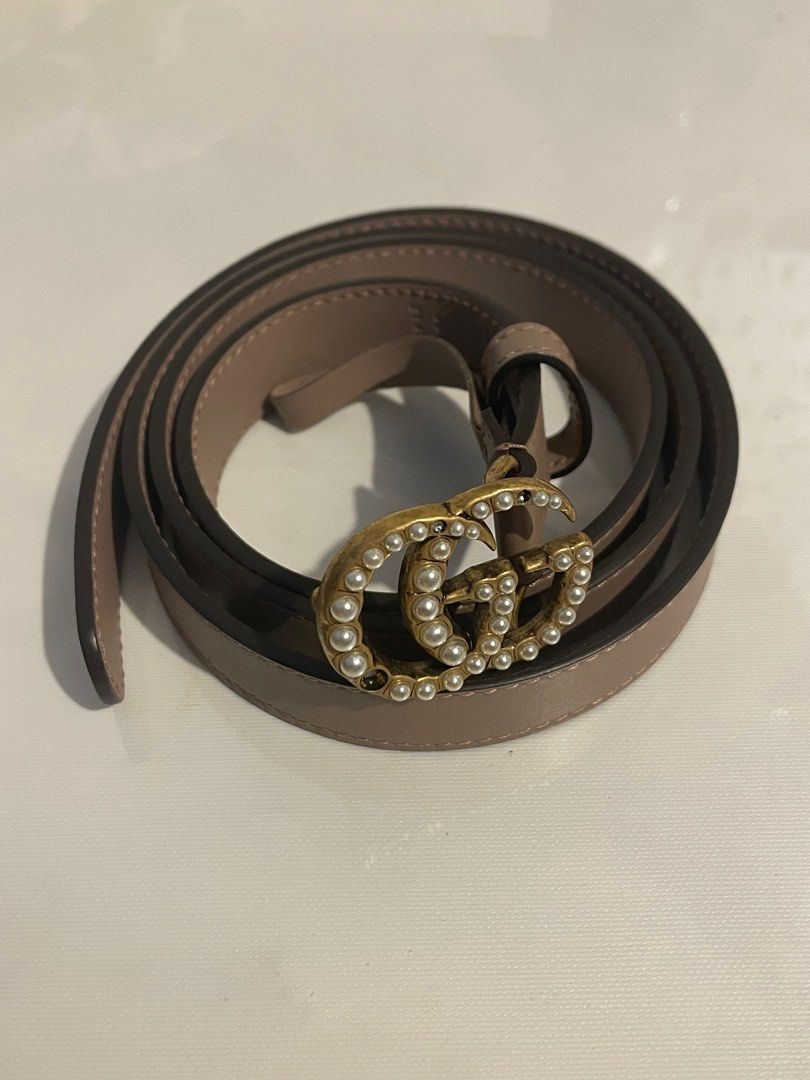 AUTHENTIC GUCCI Calfskin Pearl Double G (Category: Belts) located in Cavite. Submitted by koricat (Listing ID 1359385134, Image 1). Description: 75% off SP: ₱9,000 original price ₱38,800 - Brand new, never used - Rfs: Declutter, stock item - Condition 9/10 missing pearls - Sf must be shouldered by buyer PM for more info or any questions!!.
