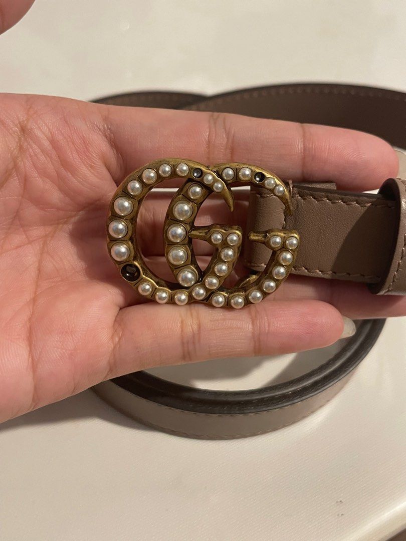 AUTHENTIC GUCCI Calfskin Pearl Double G (Category: Belts) located in Cavite. Submitted by koricat (Listing ID 1359385134, Image 2). Description: 75% off SP: ₱9,000 original price ₱38,800 - Brand new, never used - Rfs: Declutter, stock item - Condition 9/10 missing pearls - Sf must be shouldered by buyer PM for more info or any questions!!.