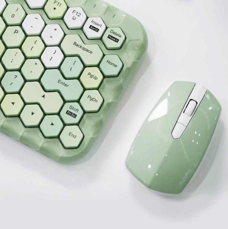 Bamboo Wireless Keyboard and Mouse Set (Category: Computer Keyboard) located in Singapore. Submitted by Margaret.shopping (Listing ID 1359332300, Image 3). Description: Bamboo Wireless Keyboard and Mouse Set Color: Blue, Green, Pink Brand: Mofii Model: Honey Distance: 10m Frequency: 2.4G Measurements: 331x148x29mm (keyboard), 110x62x30mm (mouse) Button quantity: 83 keys Weight: Approx 550g *Comes in cute pastel colors *Mini size keyboard and mous