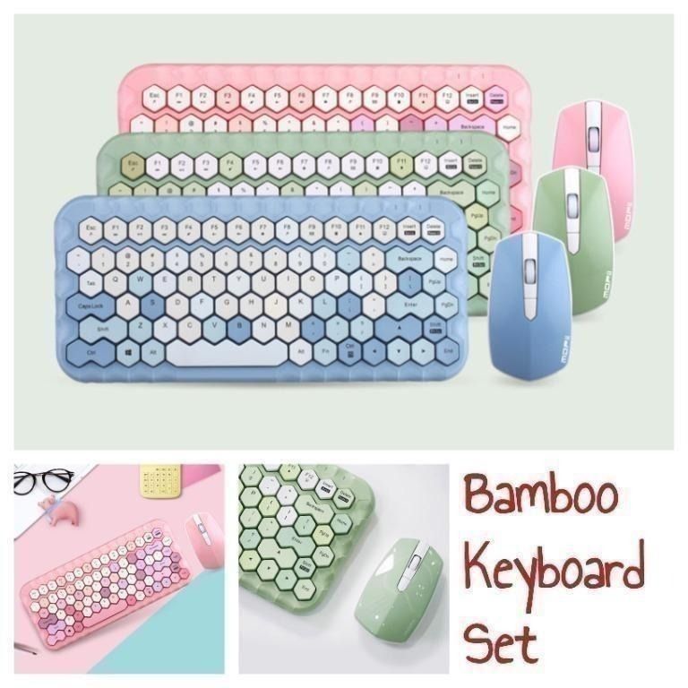 Bamboo Wireless Keyboard and Mouse Set (Category: Computer Keyboard) located in Singapore. Submitted by Margaret.shopping (Listing ID 1359332300, Image 1). Description: Bamboo Wireless Keyboard and Mouse Set Color: Blue, Green, Pink Brand: Mofii Model: Honey Distance: 10m Frequency: 2.4G Measurements: 331x148x29mm (keyboard), 110x62x30mm (mouse) Button quantity: 83 keys Weight: Approx 550g *Comes in cute pastel colors *Mini size keyboard and mous