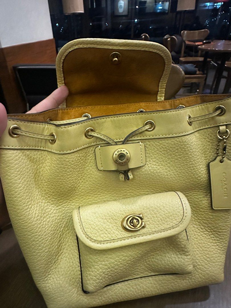 COACH RIYA 21 Backpack (Category: Luxury Bags & Wallets) located in Quezon City. Submitted by baldyosa (Listing ID 1359477827, Image 2). Description: Coach Riya 21 Backpack No damages Yellow Good condition .