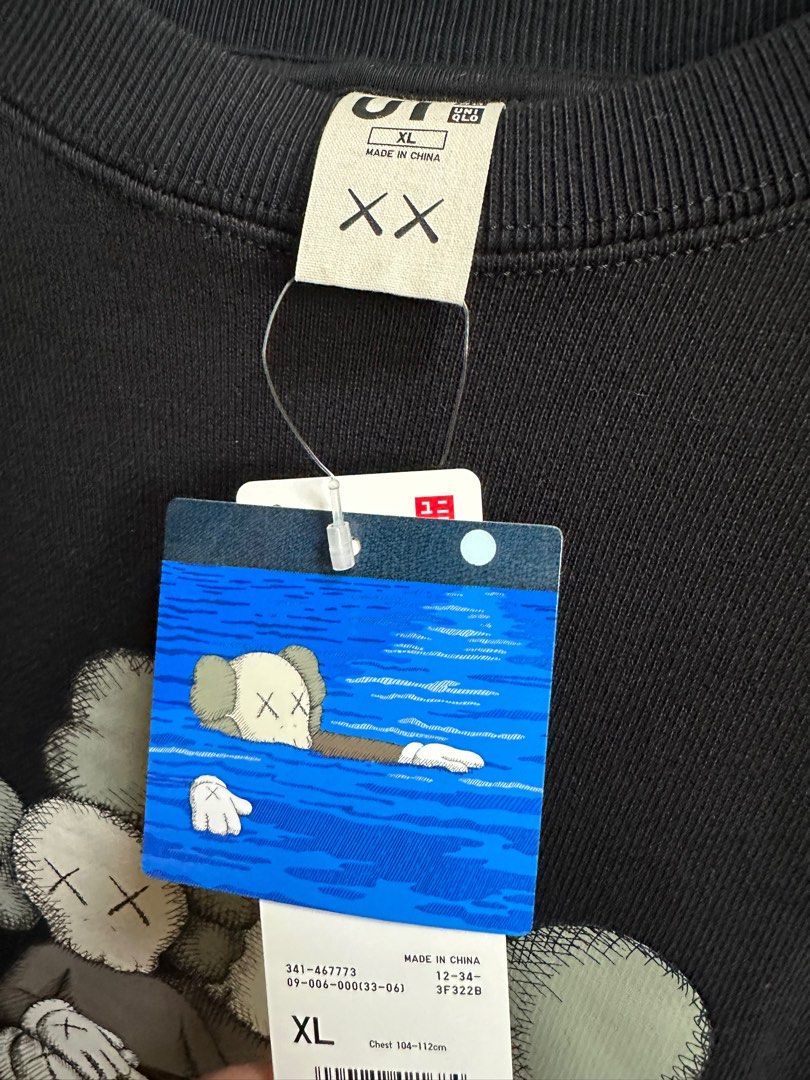 FS: Uniqlo x Kaws Sweatshirt (Category: Coats, Jackets and Outerwear) located in Paranaque City. Submitted by daluho.stuff (Listing ID 1359337198, Image 2). Description: Available Sizes: L, XL Color: Black.