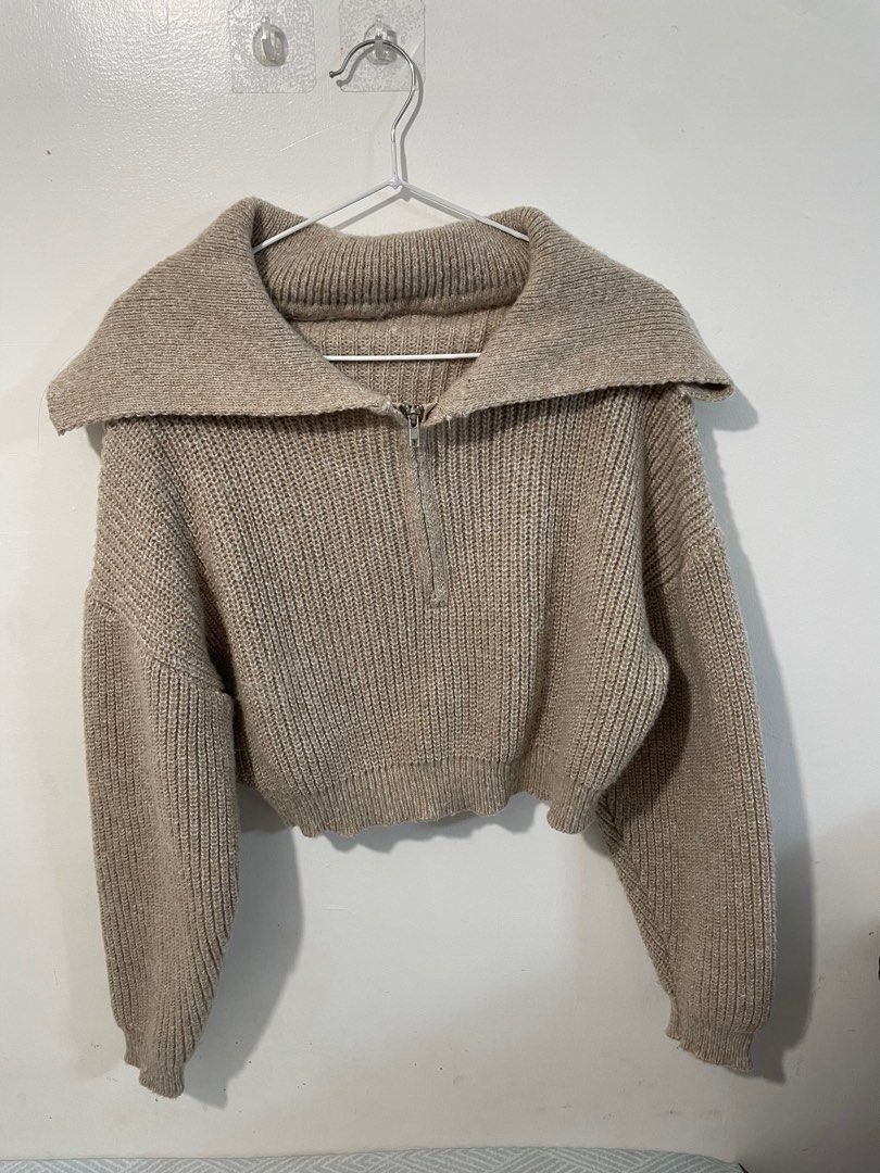 Half zip knitted top (Category: Coats, Jackets and Outerwear) located in Muntinlupa City. Submitted by declutterbyRA (Listing ID 1359454987, Image 1). Description: -Bought here in Carousell ( the seller bought i from a boutique in s. korea ) -used once -crop top - can fit XS to Semi Medium -.