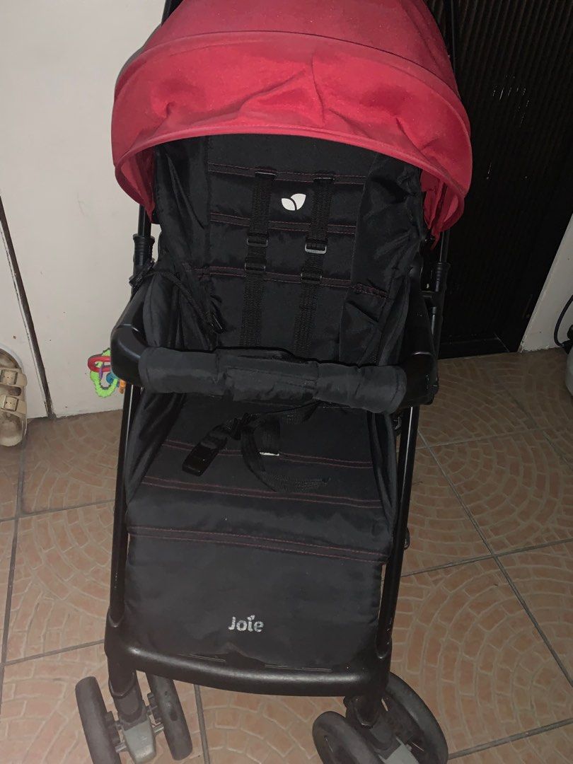 Joie Red Stroller Infant to toddler (Category: Strollers) located in Quezon City. Submitted by lsbi.sale (Listing ID 1359307685, Image 3). Description: Still intact and in good condition. RFS: Baby is now walking. For pickup only at North Olympus Subd., QC MOP: Gcash/BPI .