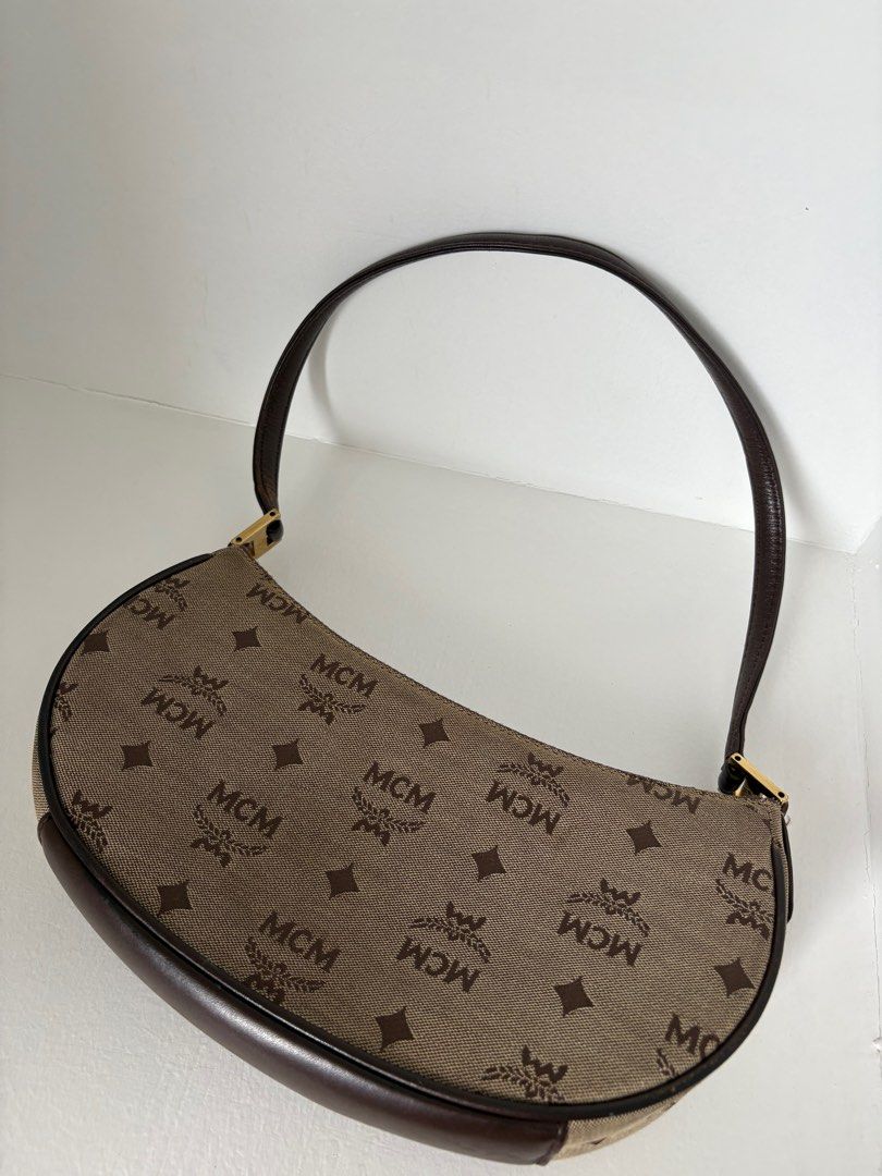 MCM baguette bag (Category: Luxury Bags & Wallets) located in Iloilo. Submitted by ashaonatelouise (Listing ID 1359423498, Image 3). Description: Authentic Turnable screws Recently cleaned No flaws.